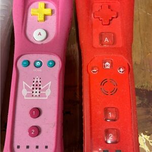 Vibrant Pink and Red Gaming Controller Wii BOTH FOR $40.00